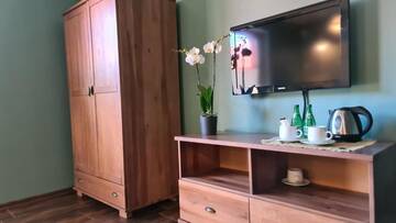 Фото номера Четырехместный номер Делюкс Апарт-отели Apartamenty La Playa г. Gorzewo 21