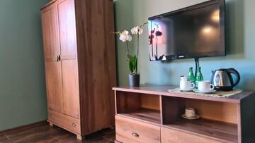 Фото номера Четырехместный номер Делюкс Апарт-отели Apartamenty La Playa г. Gorzewo 8