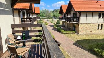 Фото номера Четырехместный номер Делюкс Апарт-отели Apartamenty La Playa г. Gorzewo 7